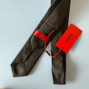 HUGO Black Tie with Bold Red Accent